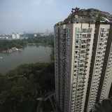 China illegal construction of villa on rooftop of residential building
