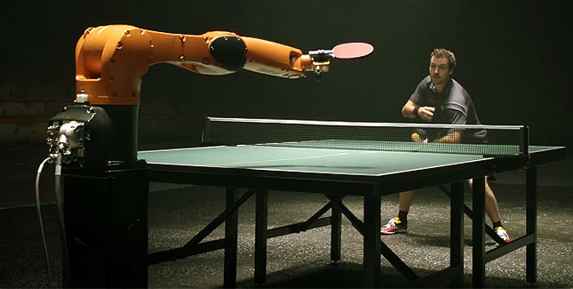 Ping Pong Match Between Robot And Man Shockblast