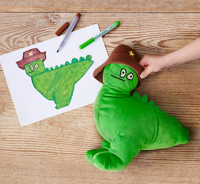 kids drawing into stuffed animal